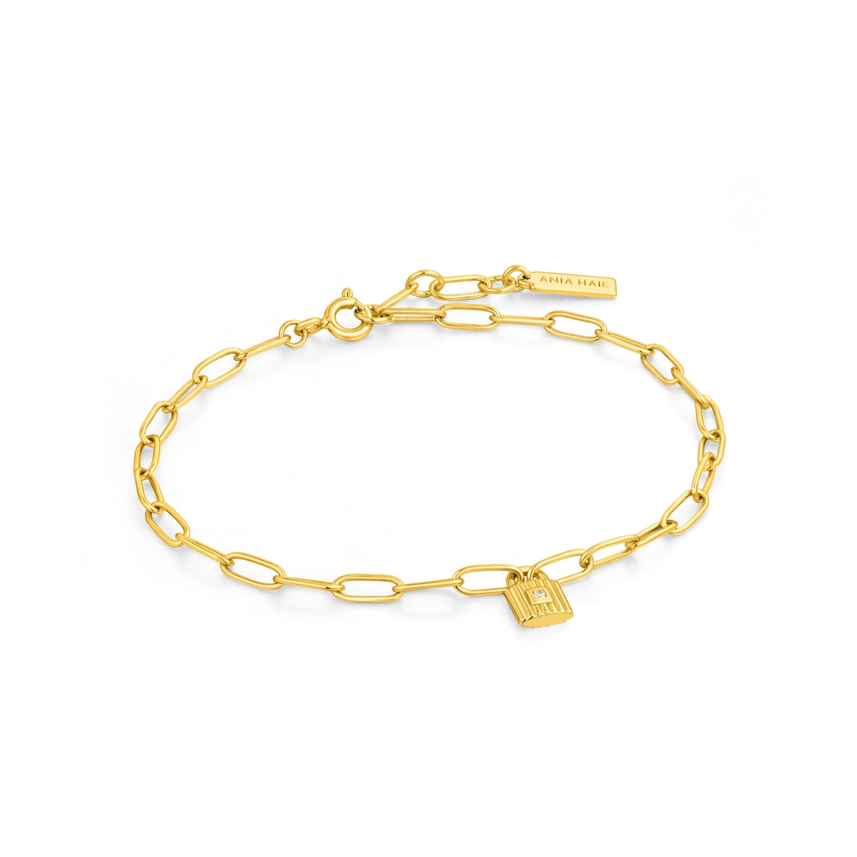 Ania Haie gouden armband met grove schakels en een klein gouden slotje als hangertje. In het midden van het slotje zit een klein steentje.