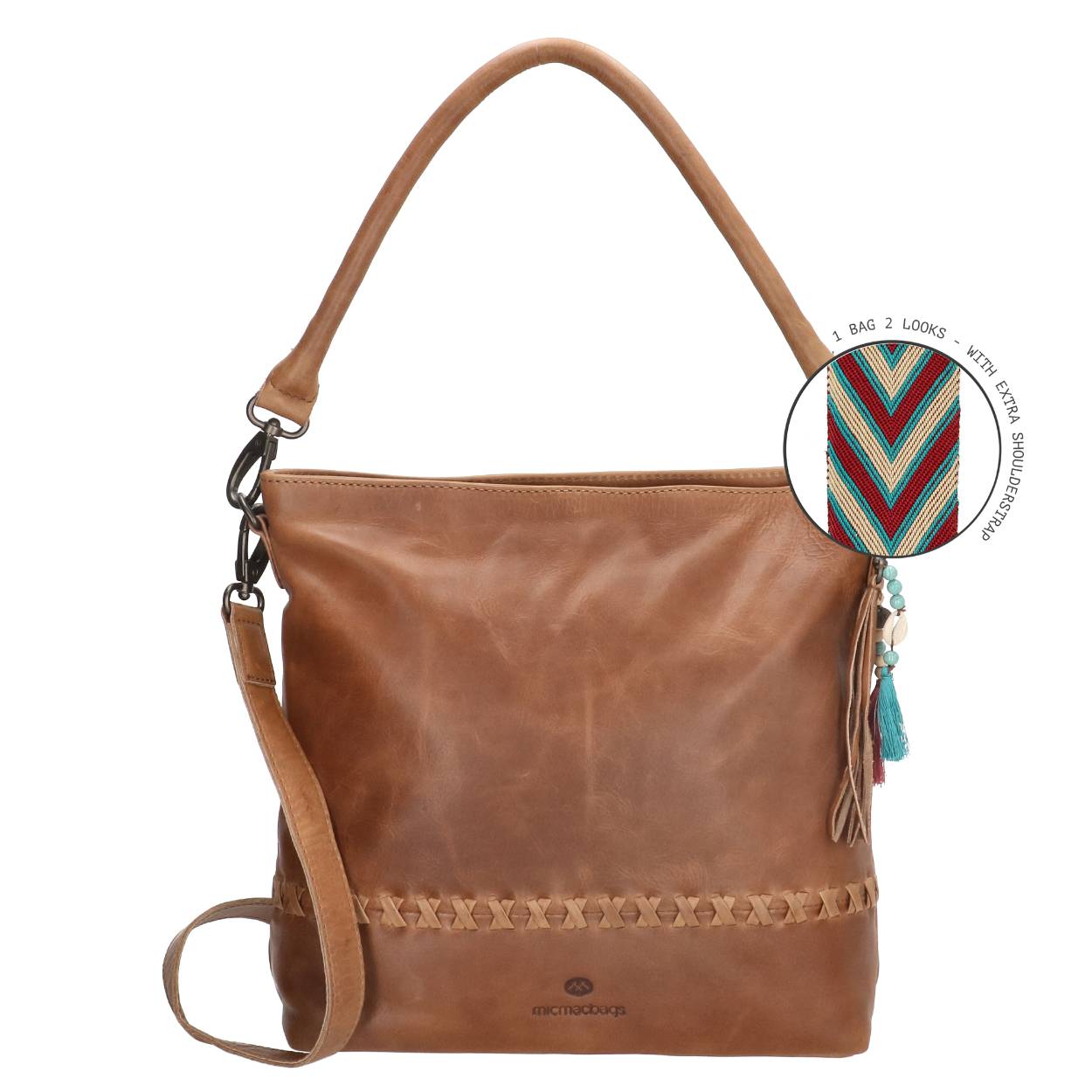 Deze ruime schoudertas uit de Micmacbags Friendship collectie is ideaal on-the-go. Je kunt er gemakkelijk al je spullen in kwijt vanwege zijn ruime formaat. De kleurrijke schouderband is opvallend aan deze tas en kenmerkend en uniek voor de Friendship collectie. Heb je toch liever een neutrale tas? Er wordt ook een leren schouderband in dezelfde kleur als de tas meegeleverd. Deze Micmacbags schoudertas is gemaakt van stevig onbewerkt leer. Het hoofdvak heeft een ritssluiting, tussenschot met rits, extra ritsvak, insteekvak voor je telefoon en een haakje voor je sleutels. Zo geef je al je spullen een goed plekje! De tas heeft ook nog een achtervak met rits. Tevens heeft elke tas uit de Friendship collectie een leuke kleurrijke tashanger, wat de tas helemaal af maakt.

De eigenschappen van deze schoudertas zijn:

Hoofdvak met ritssluiting
Ritsvak
Insteekvak
Tussenschot met ritssluiting
Sleutelhaakje
Achtervak met ritssluiting
Afneembare en verstelbare schouderband met print
Afneembaar leren handvat
Tashanger
