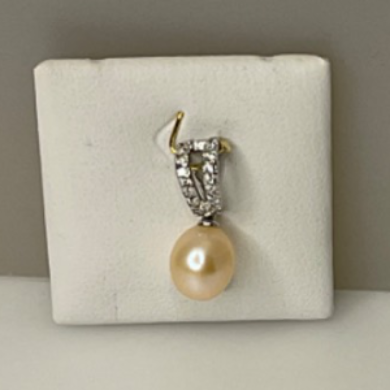 Wit goud met imitatie parel en zirkonia
