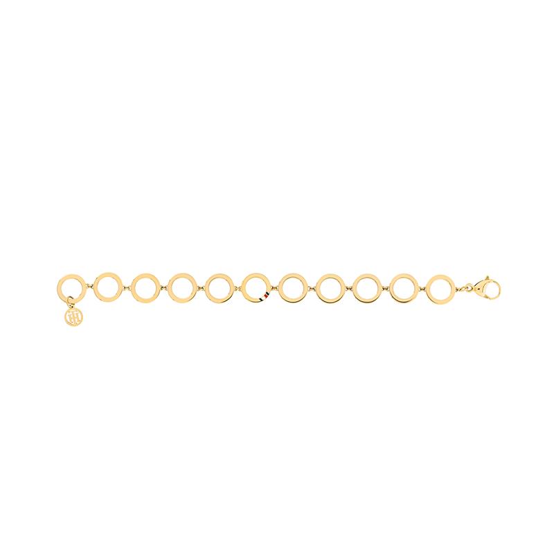 Deze goudkleurige dames armband is van Tommy Hilfiger. De klassieke dames armband is voorzien van het Tommy Hilfiger logo op de middelste ronde schakel. Mix & match met een horloge om het plaatje af te maken! De lengte van de armband is 18,7 cm.
