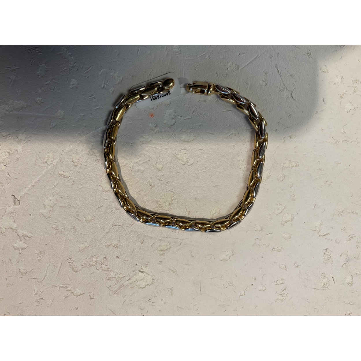 Gouden fantasie armband bicolor 19cm