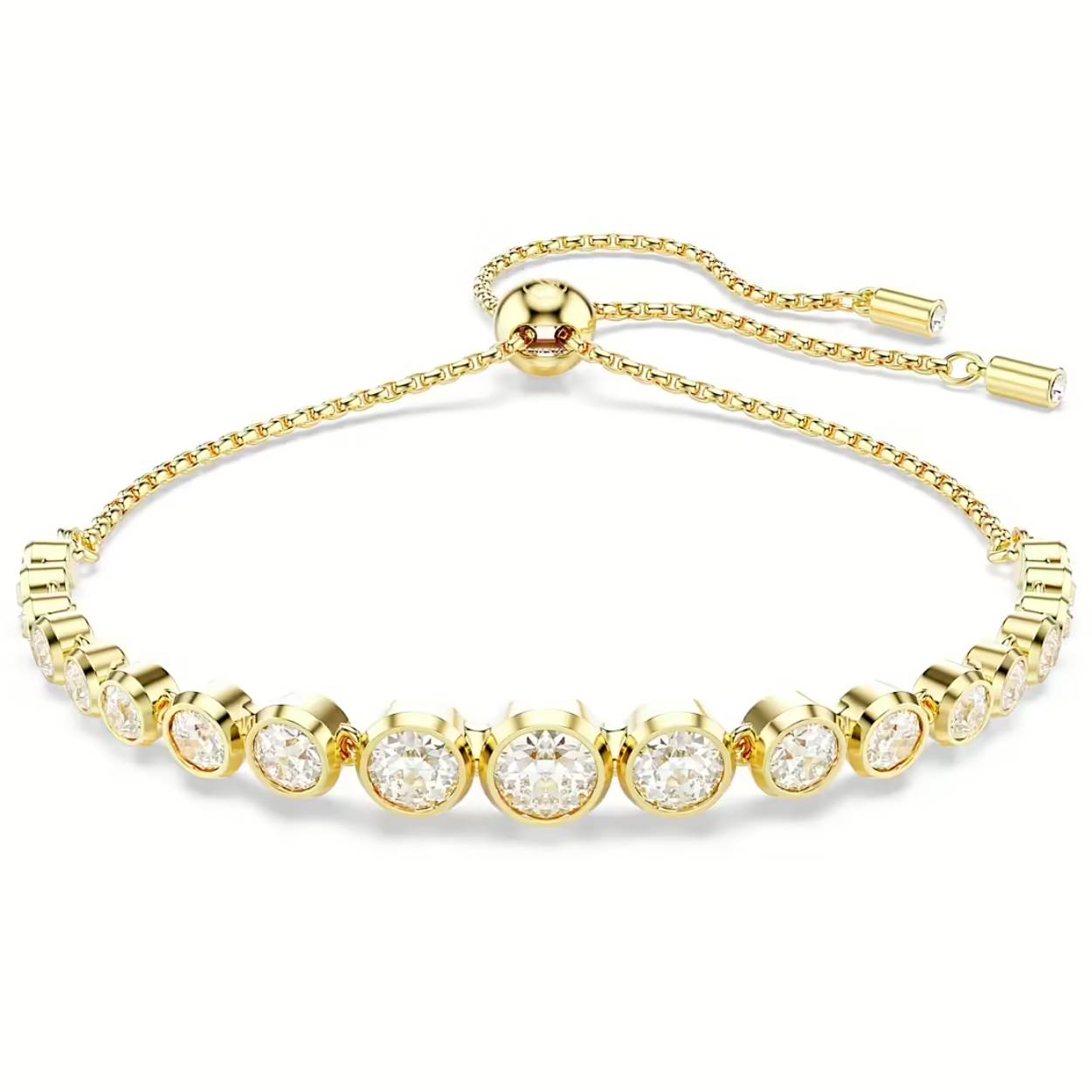 Deze goudkleurige armband staat voor alledaagse elegantie en ademt de eenvoud van de Imber-lijn. Het ontwerp bestaat uit een verloop van heldere kristallen in Round-slijpvorm, elk in een moderne bezelzetting op een soepele ketting. De armband heeft een schuifsluiting waardoor hij gemakkelijk te dragen is. Elke delicate druppel geeft uw pols een stralende elegantie. Dit is een ideaal sieraad om speels te combineren met andere stijlen.