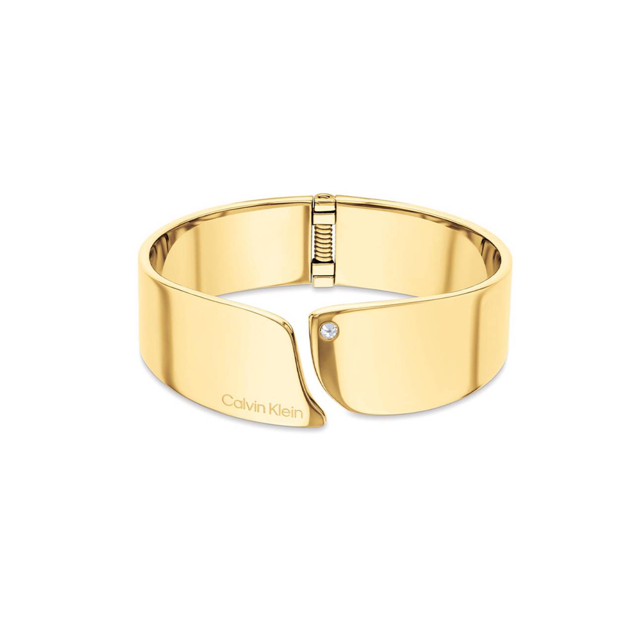 Calvin Klein CJ35000657 Dames Bangle Staal
Deze stalen dames bangle van Calvin Klein met nr CJ35000657 heeft een sierlijk uiterlijk. De goudkleurige stijve armband is open aan de bovenkant, heeft ronde vormen, is glimmend en heeft een kristal aan 1 kant en is geschikt voor een pols van 17,5cm, door de opening is de maat iets aan te passen. Leuk te combineren met andere sieraden uit de serie van Calvin Klein.

OVER CALVIN KLEIN
Calvin Klein is een wereldwijd lifestylemerk dat gewaagde, vooruitstrevende idealen en een verleidelijke, vaak minimalistische, esthetiek nastreeft. Calvin Klein werd groot in de jaren 70 door haar mode- en merkjeans collecties. In de jaren 80 lanceerde Calvin Klein haar spraakmakende ondergoed dat uitdrukkelijk van logo ’s voorzien was. Vanwege het grote succes is het merk ook succesvol uitgerold in Accessoires, Parfums, Home, Brillen, Golf, Horloges en Sieraden.
Sinds de oprichting in 1968 door Calvin Klein, heeft het merk haar reputatie opgebouwd als leider in de Amerikaanse mode, dankzij een cleane esthetiek en innovatieve ontwerpen. Calvin Klein wil haar publiek verleiden en inspireren door middel van provocerende beelden en opvallende ontwerpen die prikkelen. 

SPECIFICATIES:
- Stalen dames bangle
- 17,5cm
- Goudkleurig
- Glimmend