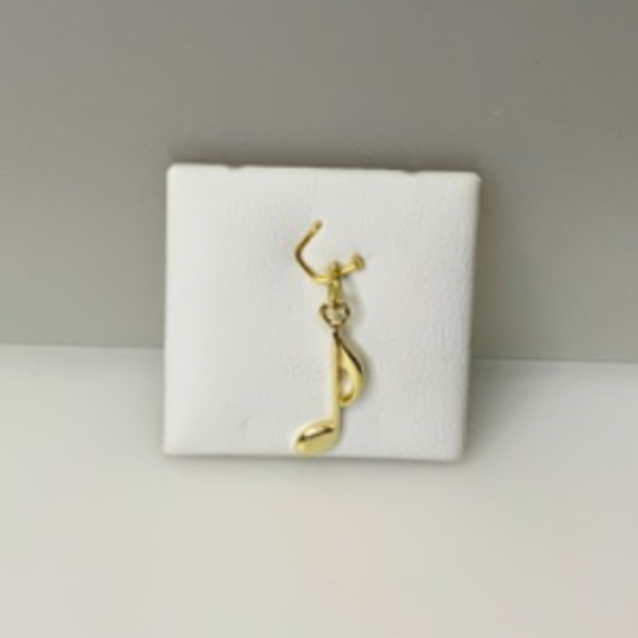Hanger/bedel goud muziek