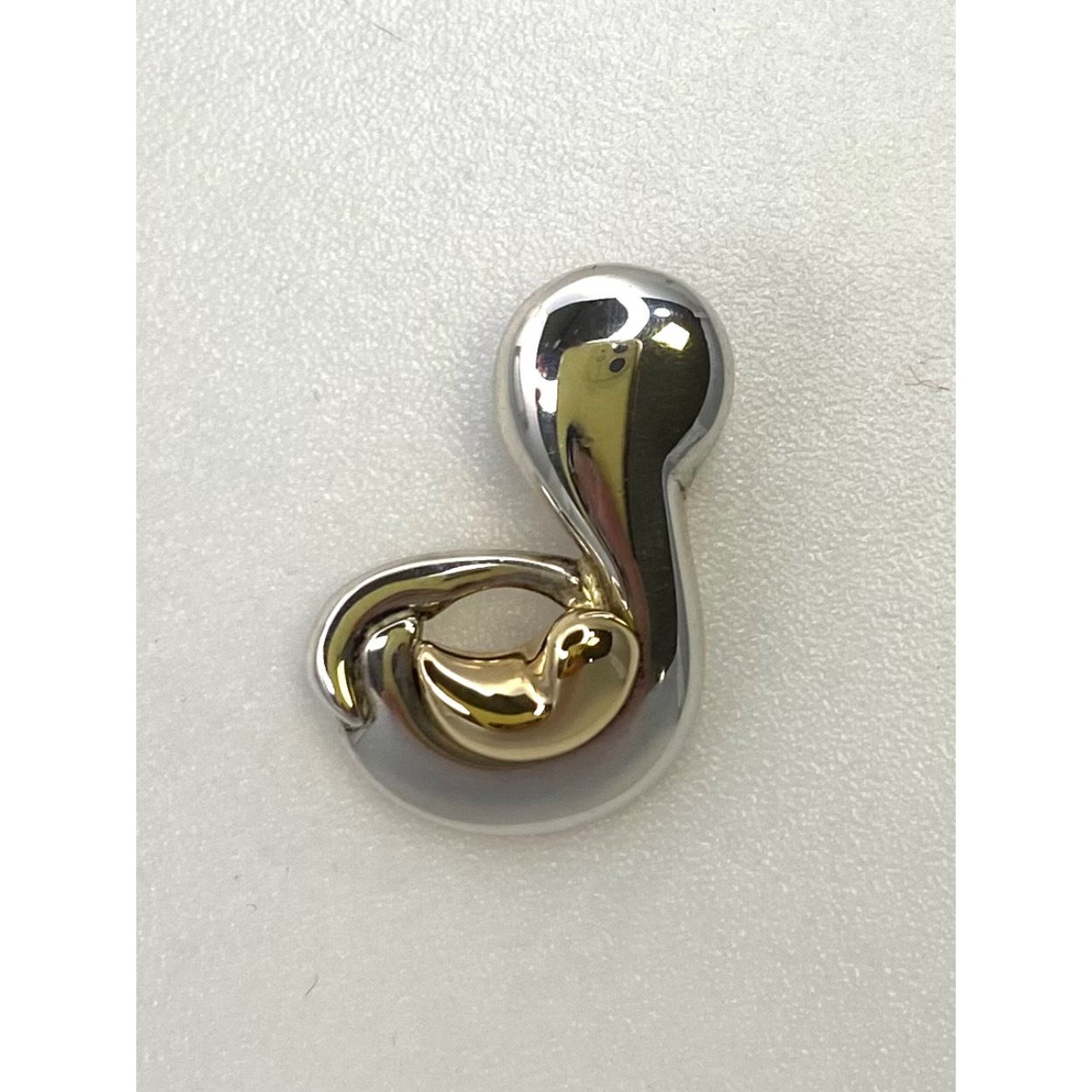 Baby in buik zilver en goud