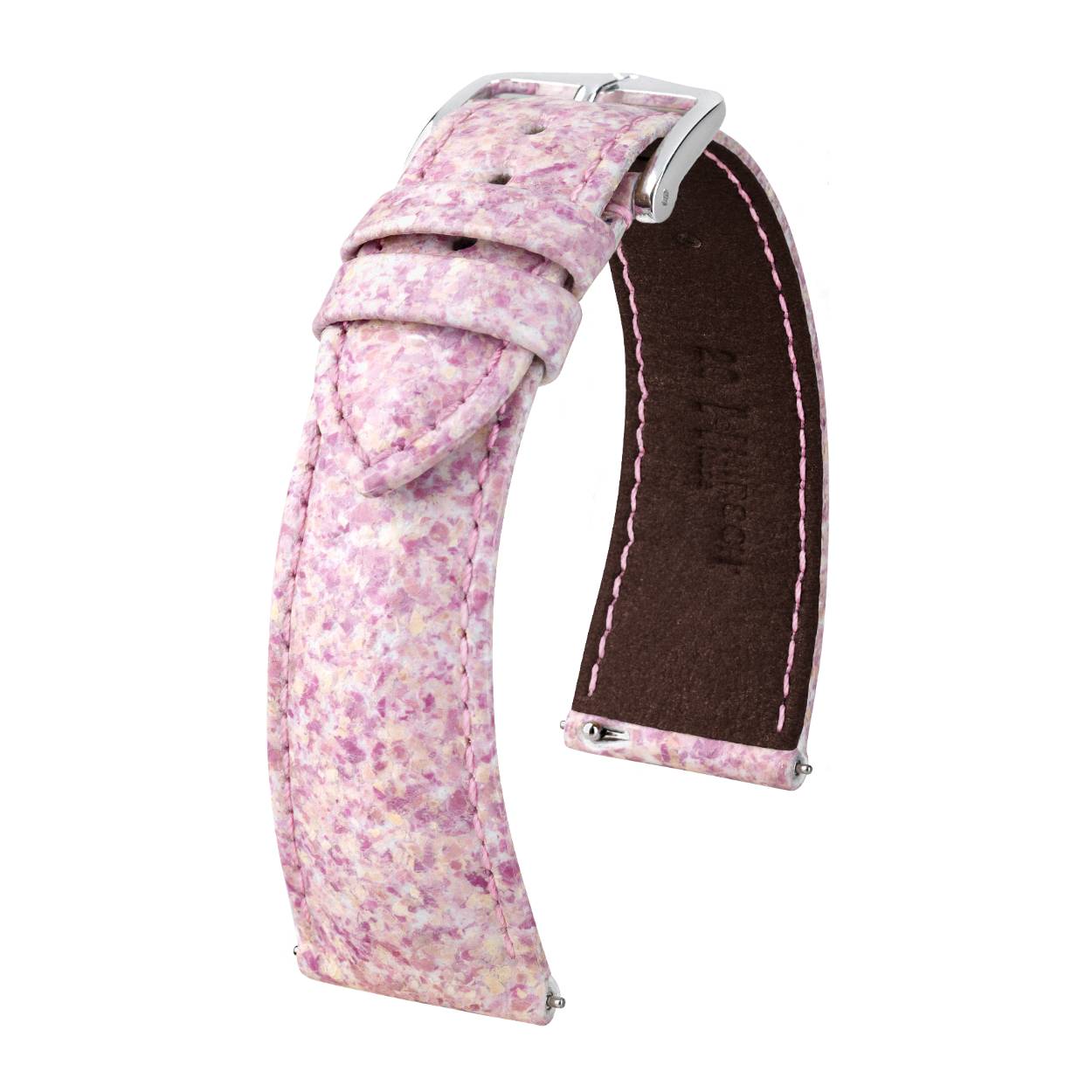 Zijdezacht en 100% diervrij. ROSE is het actuele hoogtepunt van de HIRSCH Nature Collection. Met ROSE presenteren we 's werelds eerste horlogeband gemaakt met echte rozenblaadjes. ROSE presenteert elk horloge elegant om de pols.
Gemaakt van echte rozenblaadjes
diervrij
Voor klassieke horloges en slimme horloges
Eenvoudig te verwisselen dankzij het HIRSCH Quick-Release-System
Er worden alleen verse rozenblaadjes in roze gebruikt, die met behulp van de nieuwste technologie worden gevriesdroogd. Dankzij deze milieuvriendelijke methode behouden ze hun kleur, celstructuur, vorm - en hun onvergelijkbare malsheid. Na een zorgvuldig slijpproces wordt het rozenstof met de hand op het dragermateriaal van de armband aangebracht door middel van een speciaal meerlaags proces. Er zijn in totaal 86 werkstappen totdat de unieke meesterwerken zijn voltooid.
Het ROSE-model is een natuurproduct. Dienovereenkomstig zijn er kleurvariaties van roze tot roze. In de rozen zijn ook gele componenten aanwezig. Deze kleurschakeringen maken elk horlogebandje uniek. ROSE ensceneert klassieke horloges net zo stijlvol als slimme horloges.
Details over ROSE
Fijne ton-sur-ton stiksels
Met de hand gestikte trensnaad op de sluiting
Handgenaaide veiligheidssteek op de beschermende lus
Verkrijgbaar in basisbreedtes 18 en 20