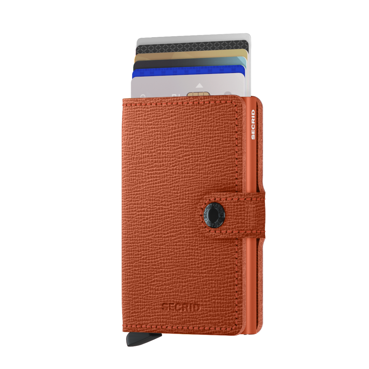 Met de Secrid cardprotector als basis, is de Miniwallet een compacte én veilige portemonnee. De portemonnee sluit af door middel van een drukknoopsluiting. De aluminium cardprotector in de Miniwallet beschermt uw belangrijkste passen optimaal, zowel tegen buigen, slijten en breken als tegen ongewenst uitlezen van RFID-kaarten (zoals de OV-chipkaart, ID-kaart, de nieuwste creditcards en bedrijfspasjes). De Secrid Miniwallet is geschikt voor 6 vlakke kaarten of 4 kaarten met verdikte letters. Naast zes kaarten in de cardprotector biedt het binnenwerk ruimte voor enkele kaarten, papiergeld, bonnetjes en visitekaartjes. De Secrid Miniwallet is een compacte portemonnee en vanwege de druksluiting gemakkelijk mee te nemen. Dankzij het unieke ontwerp schuiven de kaarten trapsgewijs naar buiten voor een eenvoudige selectie. De Secrid Miniwallet wordt geleverd in een mooie verpakking en daardoor ook zeer geschikt als uniek cadeau. Crisple variant: gecorrigeerd leer en hierdoor gemakkelijk te onderhouden. - Vervaardigd uit echt Europees leer - Sluit af met een drukknoopsluiting - Protector gemaakt van massief aluminium - Formaat slechts 21 mm dik - Ruimte voor 6 vlakke kaarten of 4 kaarten met verdikte letters (bepaalde creditcards) - Extra ruimte voor briefgeld, visitekaartjes, garantiebonnen of 4 extra passen - Geschikt voor enkele munten - Beschermt kaarten tegen buigen, slijten, breken en ongewenst uitlezen (skimmen) - Met één druk op de knop schuiven de kaarten trapsgewijs naar buiten 2 jaar garantie