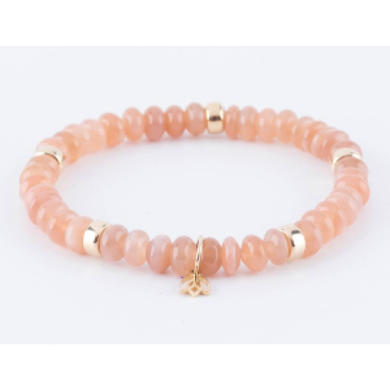 Y&G Maansteen

Edelstenen armband (6x4mm kralen) | Vijf 14kt gouden beads & tulp logo