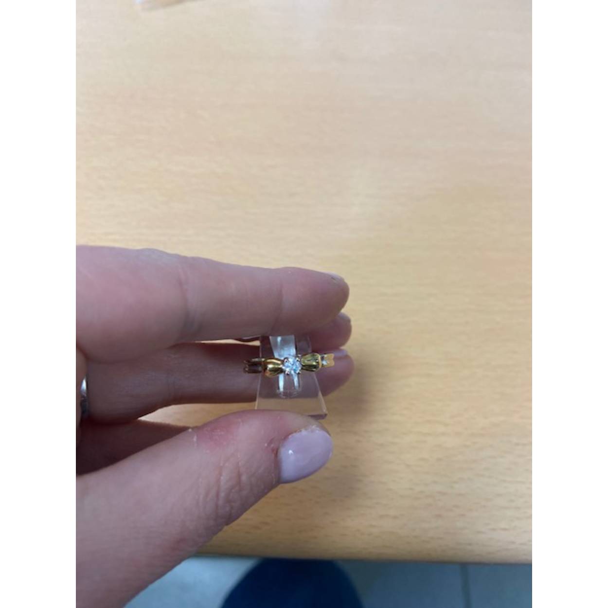 Ring solitaire bicolor, met diamant: 0,12 ct