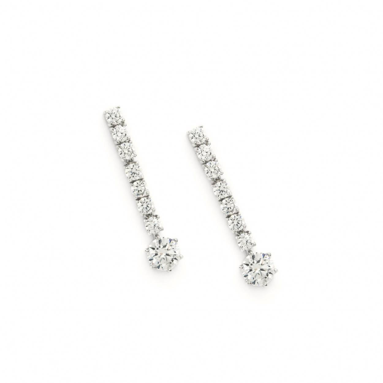 Earrings with a rigid linear design adorned with brilliant-cut white zircons, with a brilliant-cut adamantine quartz at the end. Ideal piece to look spectacular in the best moments of your life!