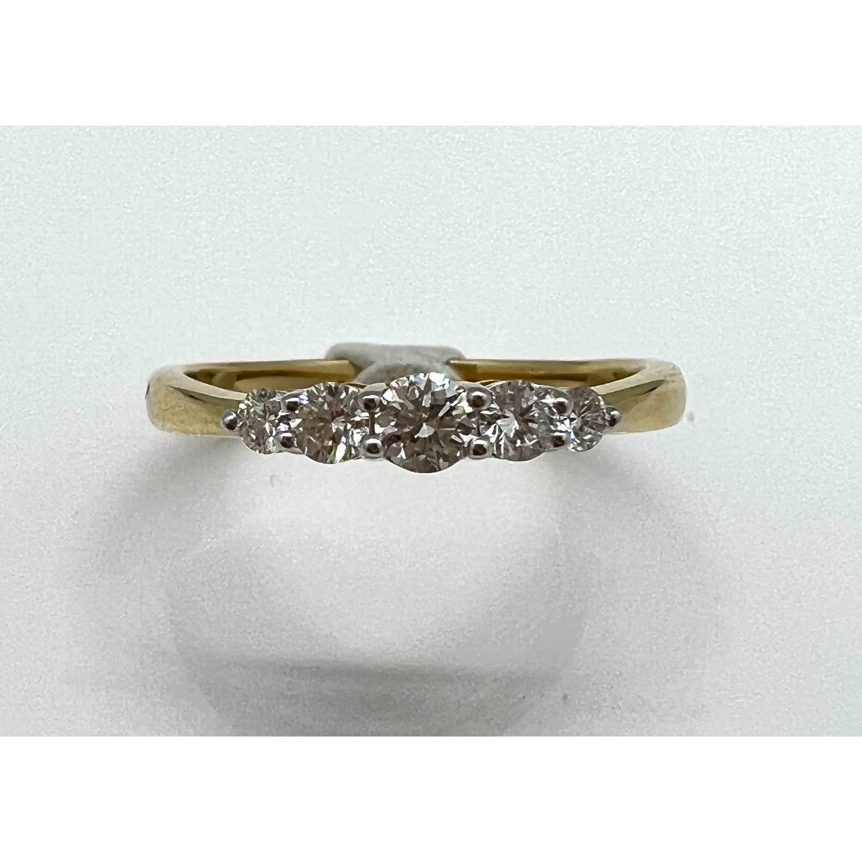 geelgouden dames ring met 5 stuks diamant