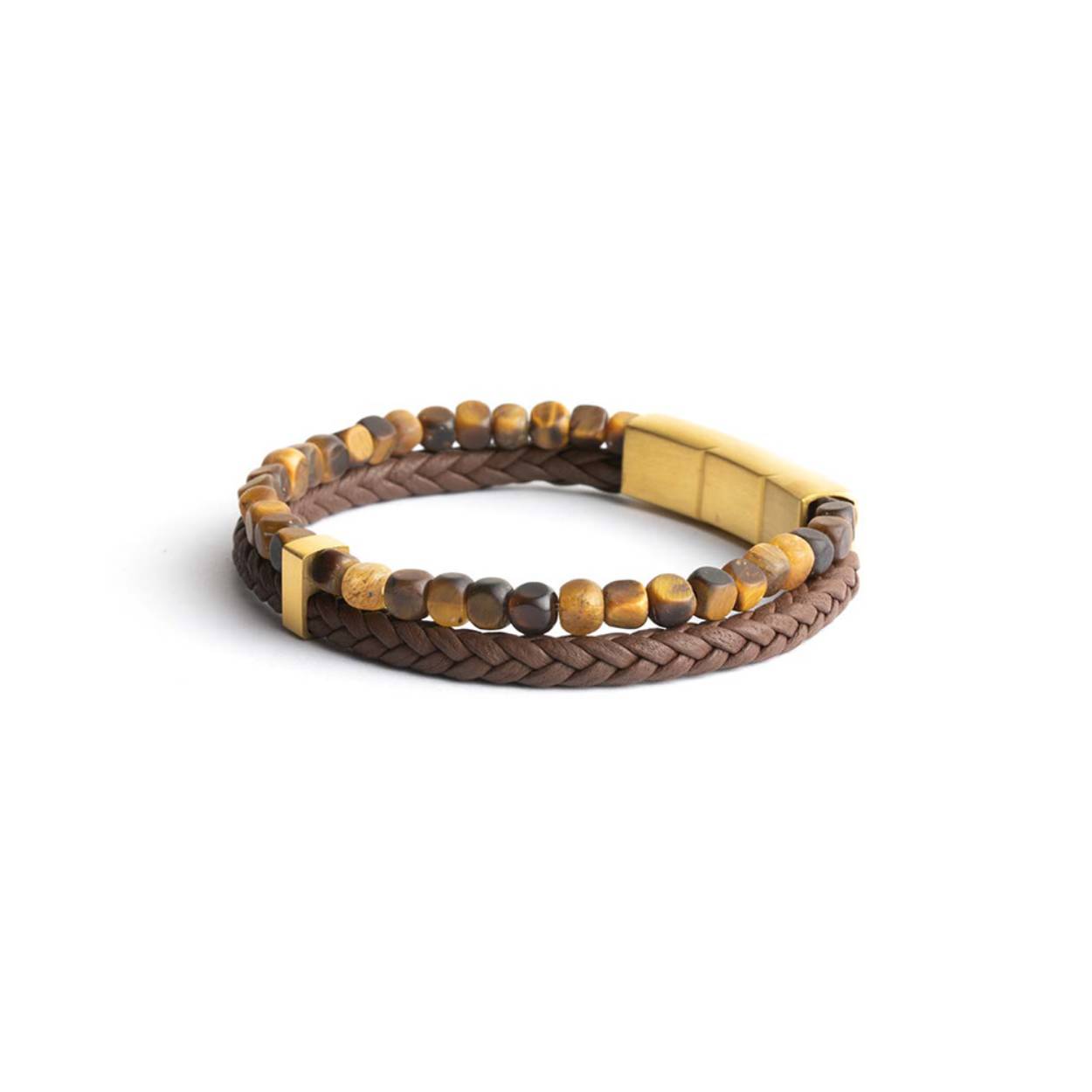 Het bruine leder dat voor deze Double Brown is gebruikt, is werkelijk uitzonderlijk: het wordt met de hand geweven in Toscane, Italië. Je zult duidelijk het verschil voelen met elk soort leder dat je ooit hebt geprobeerd. 

De armband is afgewerkt met 4mm Tiger Eye stenen. Tiger Eye wordt vaak de "Steen der Krijgers" genoemd. Het is een krachtige steen die je beschermt tegen negatieve invloeden van buitenaf. Hij wordt ook geacht je moed, kracht en doorzettingsvermogen te vergroten.
