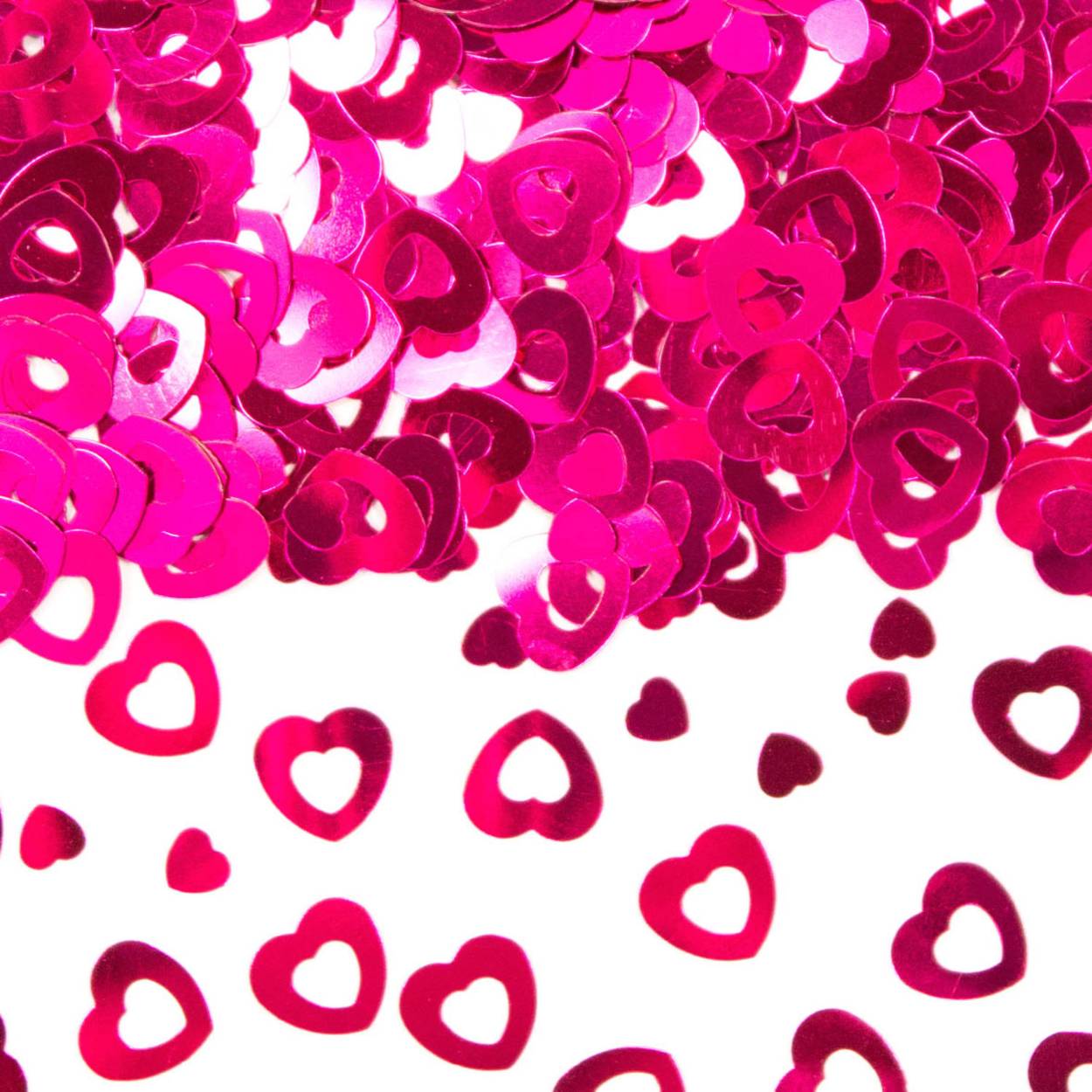 Tafeldecoratie / sierconfetti hart roze. Inhoud: 14 gram confetti. Bijvoorbeeld te gebruiken tijdens de volgende feestgelegenheid/feestgelegenheden: Valentijnsdag, Moederdag en Bruiloft. Doelgroep: kinderen en volwassenen. Het artikel is gemaakt van plastic.