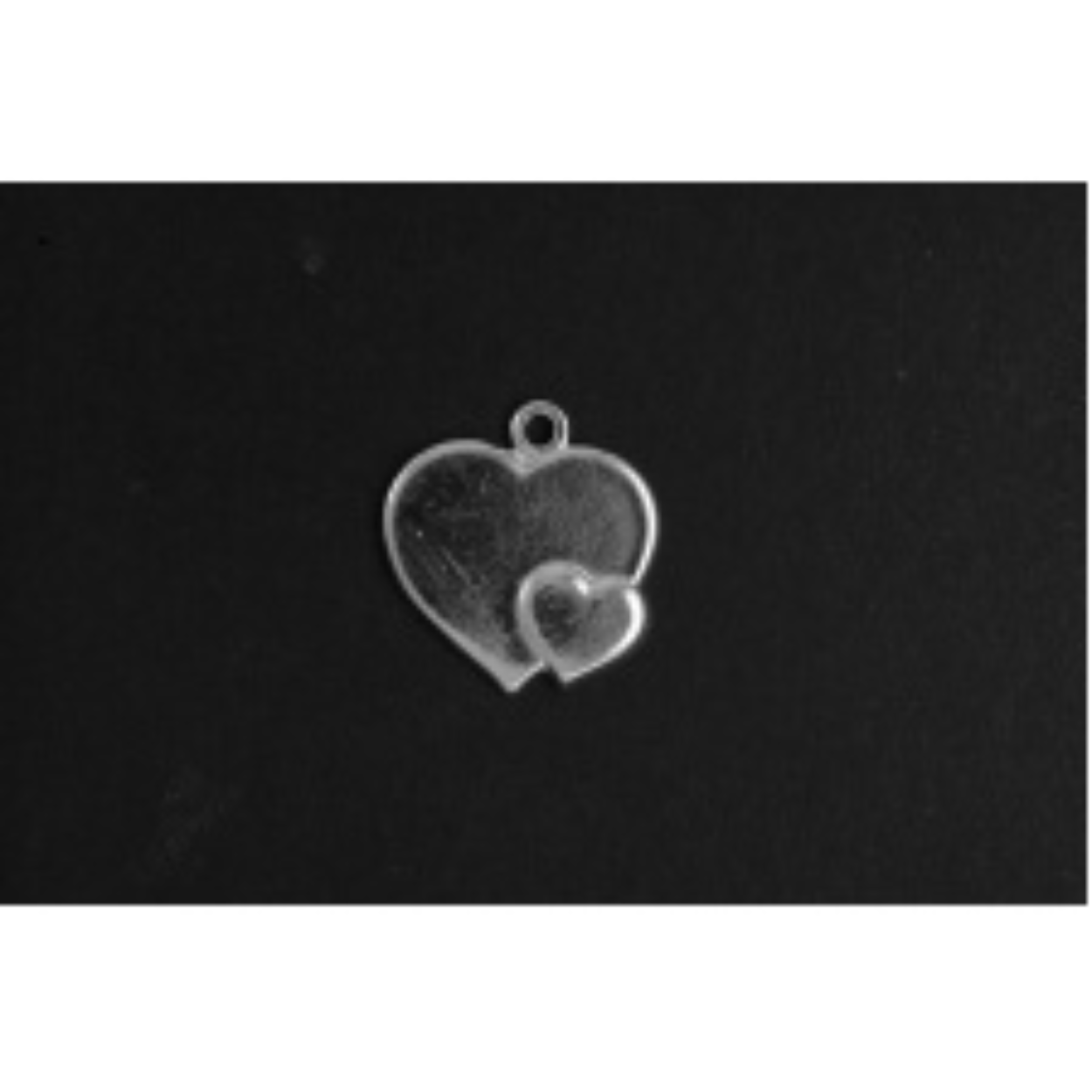 Hart dubbel massief zilver
De bedel maat is in mm Lengte x Hoogte
± L 16.64 x H 17.80