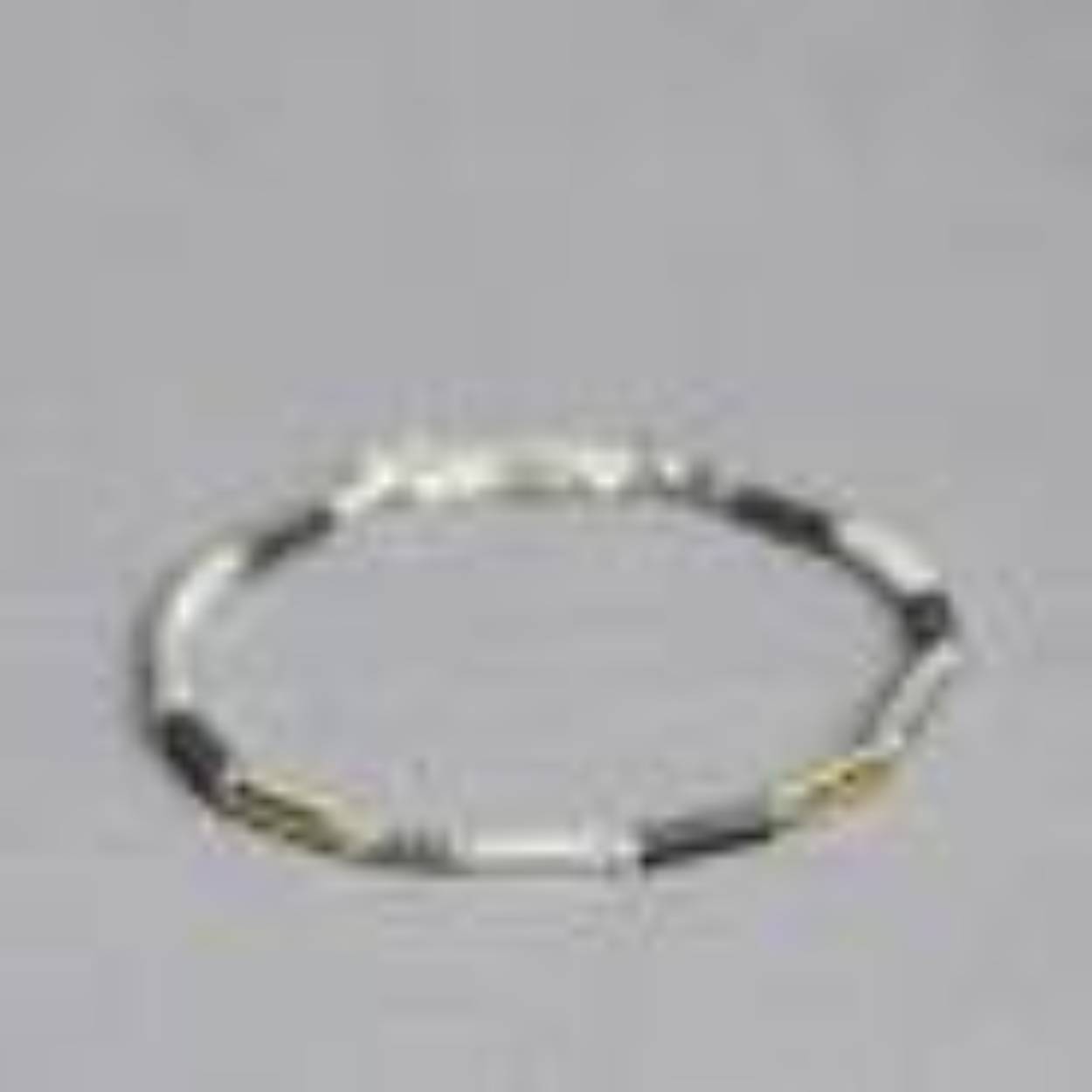 Armband uit de Touch of Gold-collectie van Jéh Jewels, gemaakt van 925 sterling zilver, geoxideerd zilver en Goldfilled. Combineer deze armband met het bijpassende collier. Verkrijgbaar in verschillende lengtes.