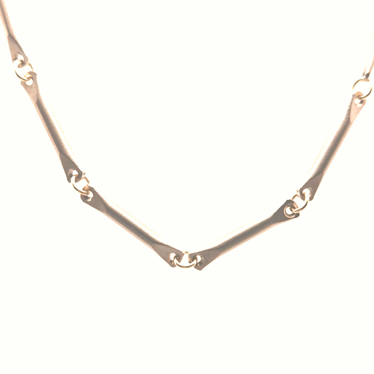 titanium collier met gouden tussen ogen