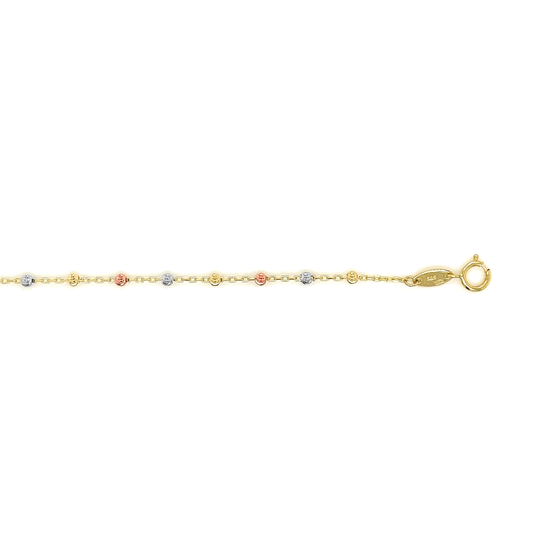 Deze 14-karaats tricolor gouden armband is ontzettend leuk! De ankerschakel wordt onderbroken door fantasie bolletjes. De bolletjes zijn geelgoud, witgoud en rosé goud. De armband is verstelbaar van 17cm tot 19cm.