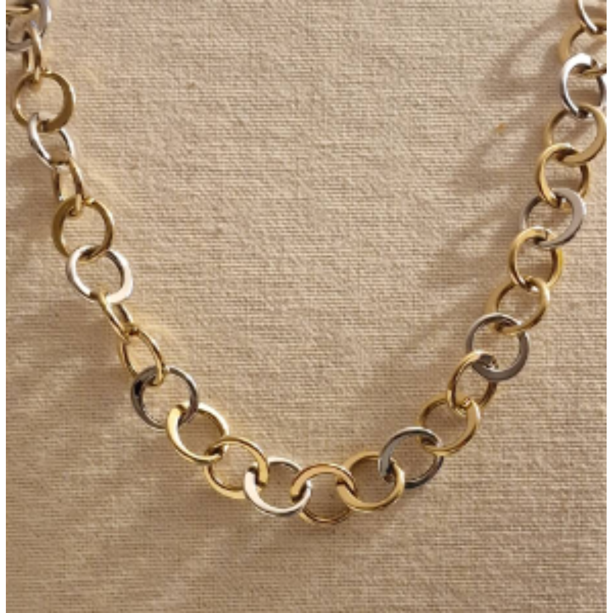 14k geel-witgouden collier van cirkels op 47 cm lengte