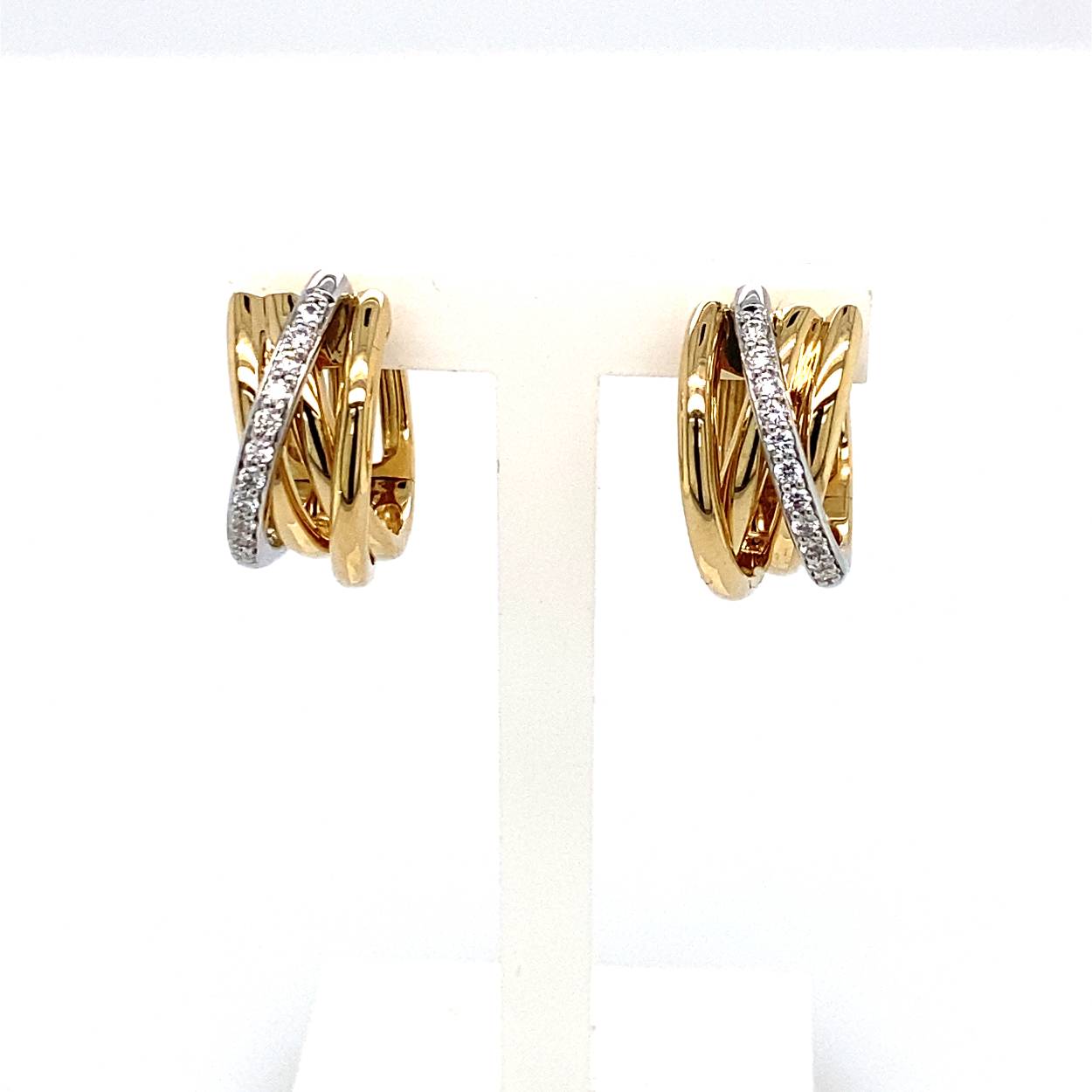 14 krt bicolor gouden creolen met diamant 0.19ct W/si