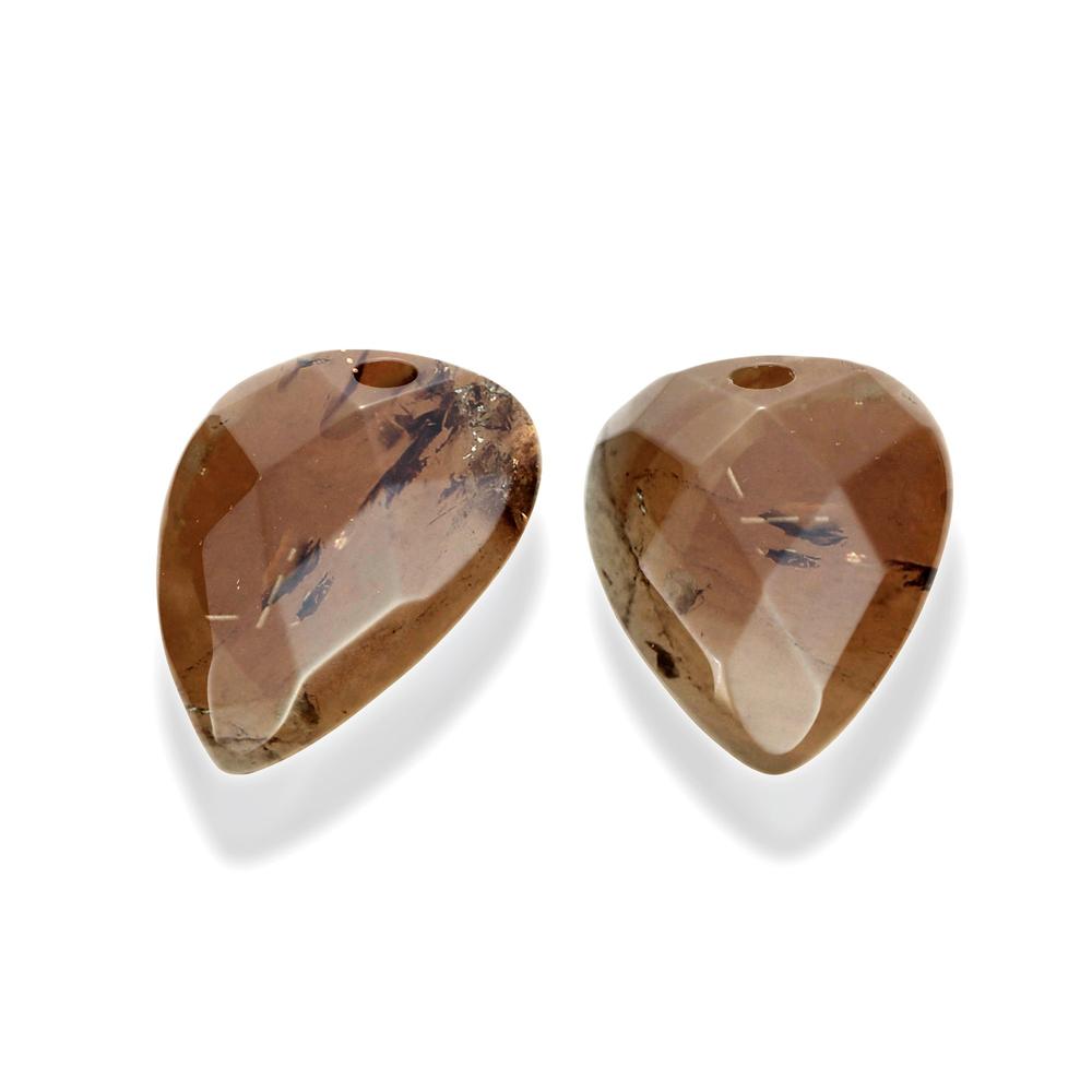 Sparkling Jewels biedt een kleurrijke collectie door het gebruik van de fijnste edelstenen. De gefacetteerde Smoky Quartz Blossom oorstenen zijn perfect om te combineren met verschillende oorbellen.

Gefacetteerde Rookkwarts edelstenen
Lengte 33mm x Breedte 21mm