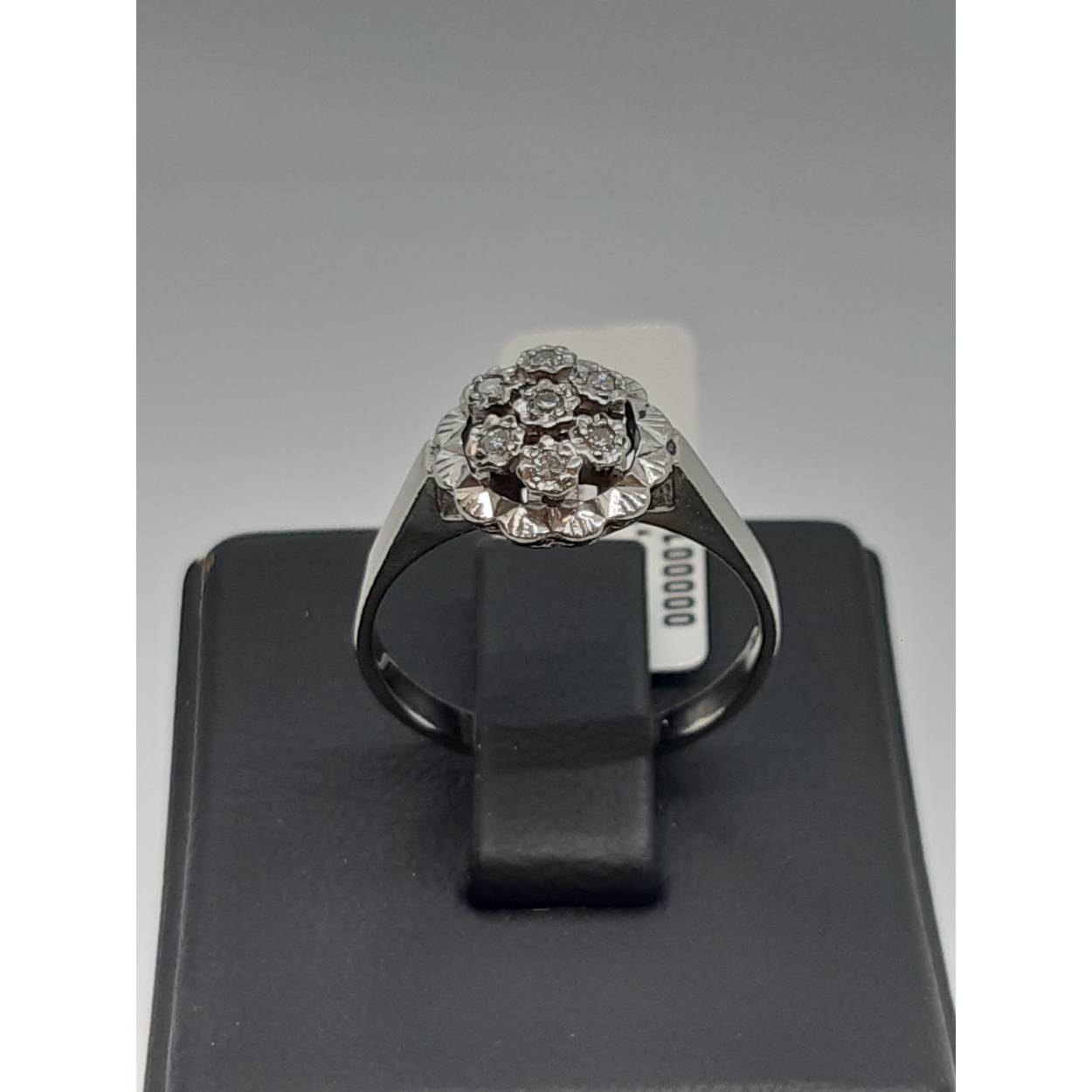 witgouden ring14k 7-.001
met briljant 