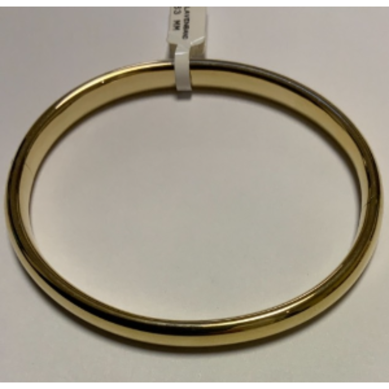 Goud bangle armband glad bol met scharnier.
Doorsnede ; 63 mm
Breedte; 7 mm