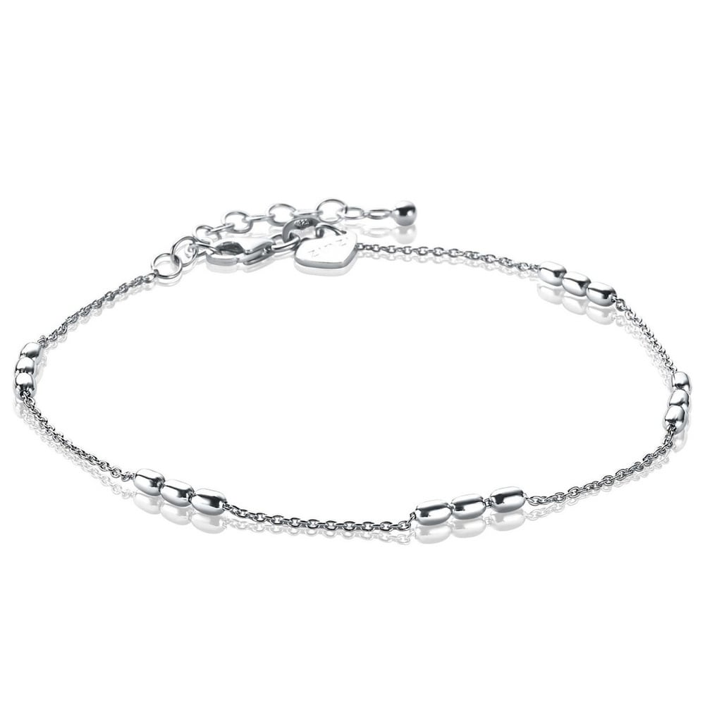 ZINZI zilveren fantasie armband, bestaande uit een anker schakelketting met drie ovale staafjes. Deze ovaaltjes zijn gelijk verdeeld over de lengte van de armband. Een tijdloos model en ideaal om te combineren met andere armbanden uit de Zinzi collectie. De lengte is te variëren van 17 tot 19,5cm. Vervaardigd van eerste gehalte zilver (925) en voorzien van een extra rodium laag voor een langdurige glans.