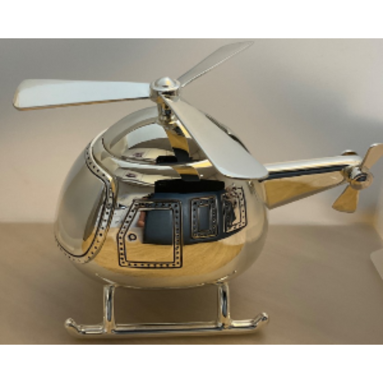 Verzilverde spaarpot helikopter 