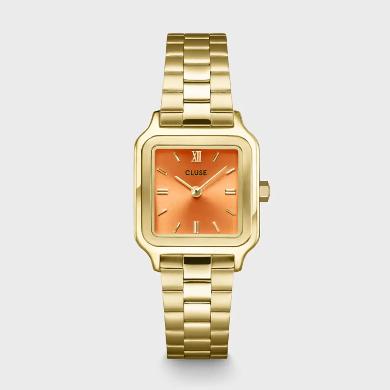 Voeg een gevoel van luxe en verfijning toe aan je look met het Gracieuse Petite dameshorloge. Met een vierkante goudkleurige horlogekast van 24 mm, een abrikooskleurige wijzerplaat en een roestvrijstalen horlogebandje van 14 mm. Pas makkelijk de look van je horloge aan met elk horlogebandje van 14 mm.