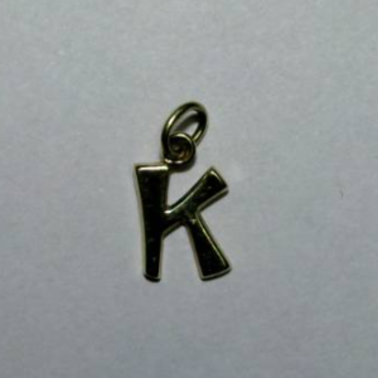 Gouden letterhanger