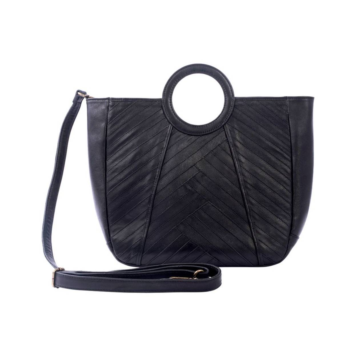 Roxy Shopper *Super fashionable en praktische shopper met rond handvat en gestikt leerpatroon. Handige shopper van stevig leer met opvallende stiksels aan beide kanten. De Roxy heeft een groot binnenvak en is afsluitbaar met een rits. In het achterste vak zit nog een extra vak afsluitbaar dmv een rits en in het voorste vak bevinden zich nog twee insteekvakken voor bijv.je telefoon. De Roxy shopper wordt geleverd met een lange verstelbare afneembare schouderband. Aan de achterzijde van de tas bevindt zich een extra vak met rits. De Roxy Shopper is onderdeel van onze “firm ox bags” serie, deze ox bags kenmerken zich door volnerf stevig en tegelijkertijd soepel leer. De Chabo ’s worden met zorg op een plantaardige manier gelooid en gekleurd, zonder het gebruik van schadelijke stoffen.

Artikelnummer:
202459_CID10_One Size
Leverbaar In:
Diverse kleuren
Hardware:
Antic Brass
Schouderband:
Afneembaar en verstelbaar
Leersoort:
OX
Sluiting:
Ritssluiting
afmeting:
39x29x11 cm
