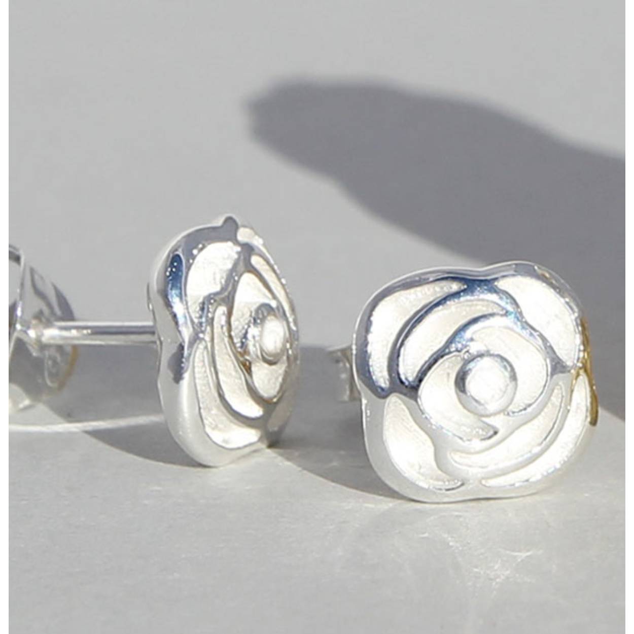 Oorknoppen zilver roos
