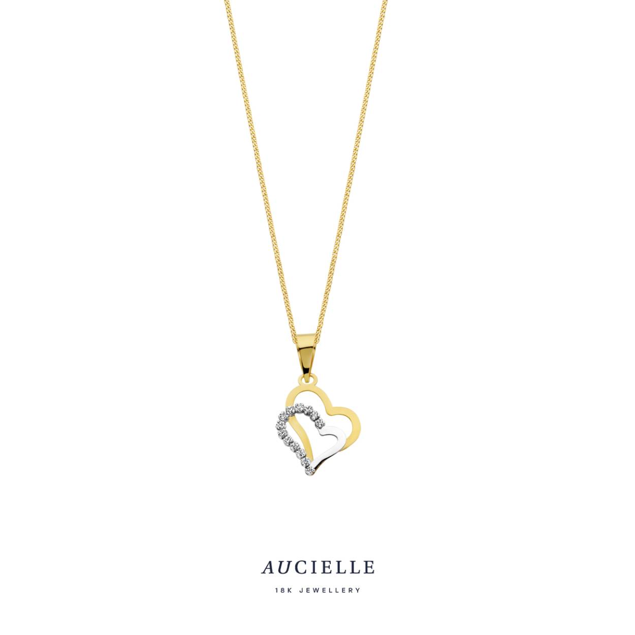 18 kt gouden hanger met zirkonia's van het merk Aucielle
Exclusief ketting