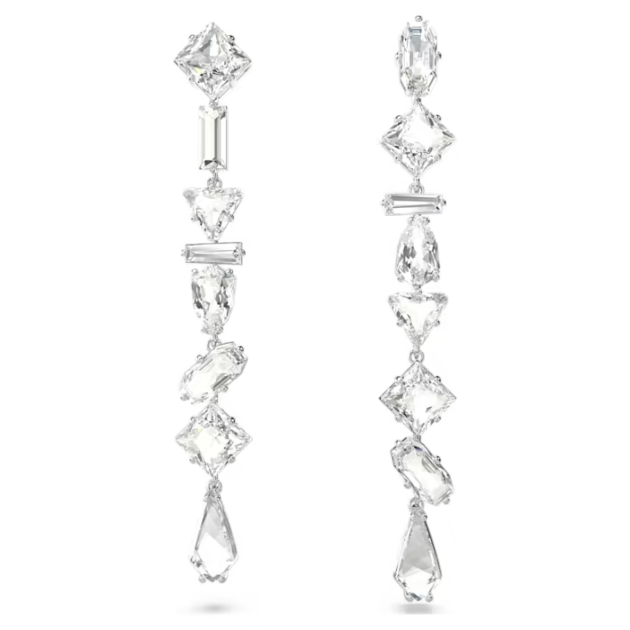 Deze stralende Mesmera-oorbellen passen perfect bij een extravagante stijl. Het prachtige ontwerp van elk sieraad bevat verschillende kristallen in klauwzettingen met een rhodium toplaag, waarvan elke steen een andere vorm heeft. Door de prachtige combinatie van opvallende facetten zijn ze ideaal als een elegant cadeau voor een dierbare.