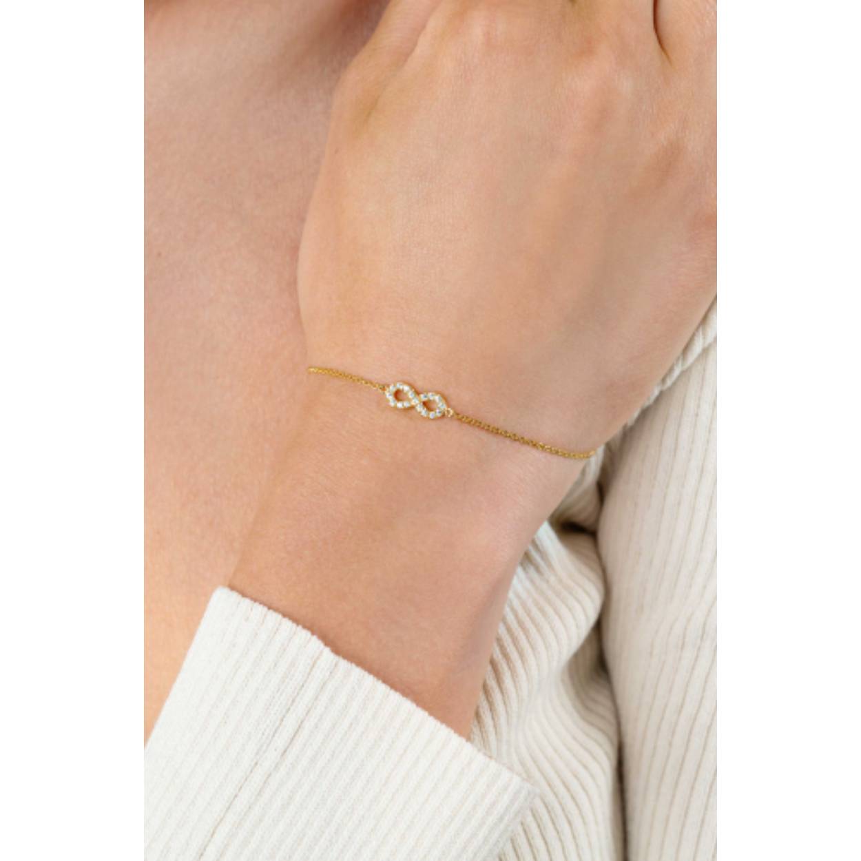 ZINZI gold plated zilveren armband met Infinity teken, vol bezet met witte zirconia's 17-19cm ZIA2597Y
