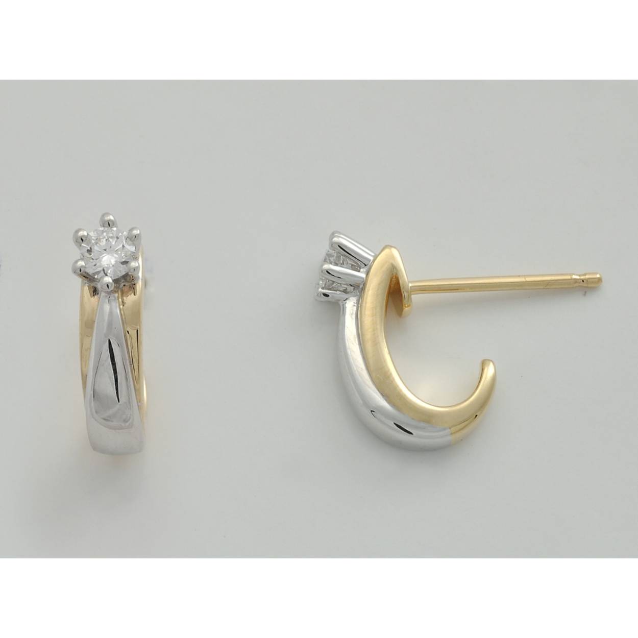 Bicolor oorstekers met briljant 0.30crt H/VS