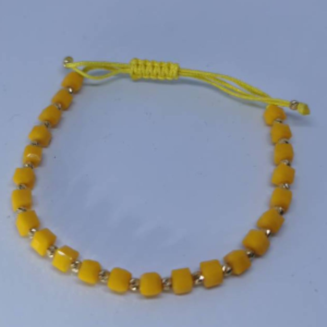 14 Karaat geel gouden armband met doreka en gele steentjes 