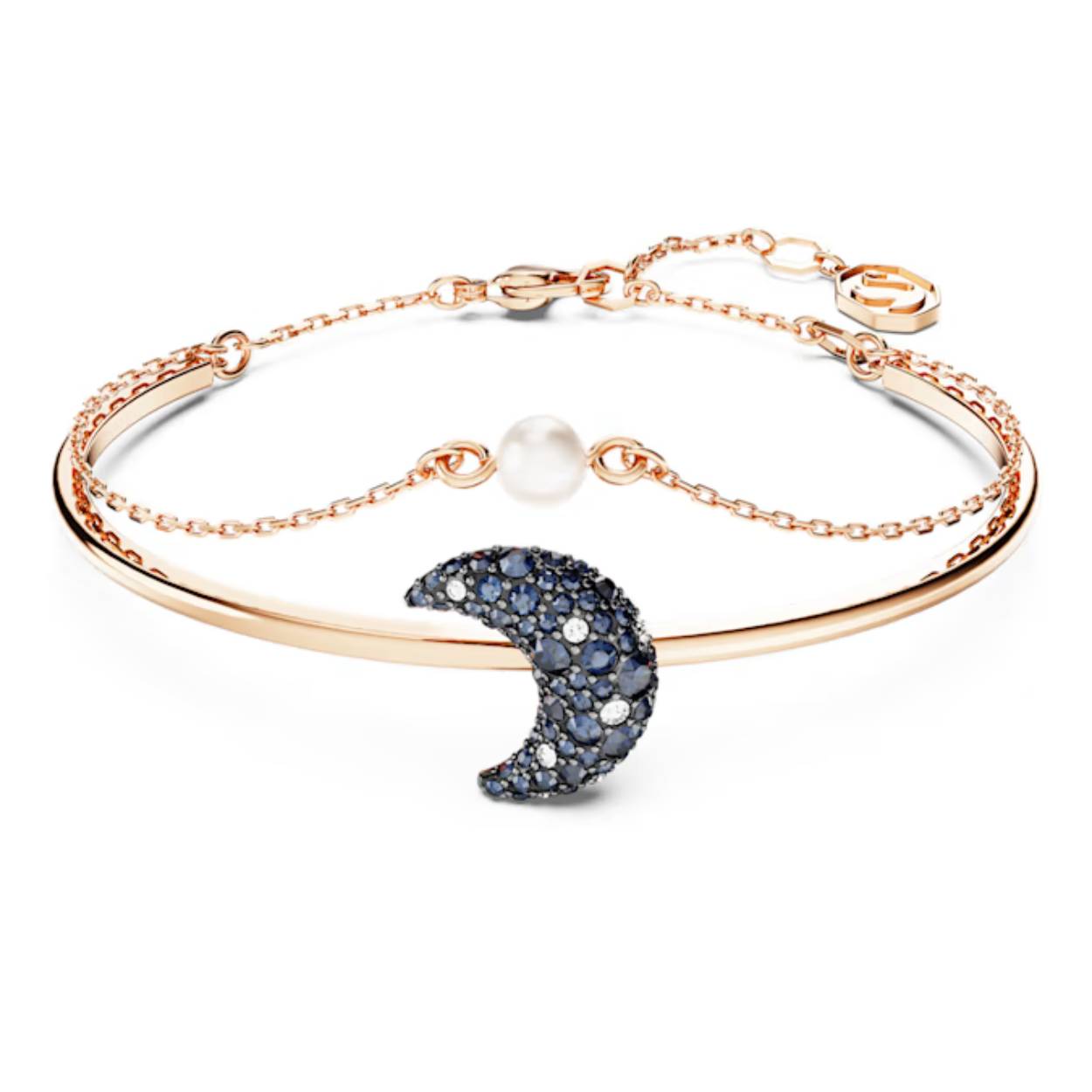 Deze dubbele Luna-armband is gewoonweg betoverend en maakt elke outfit speciaal. Het ontwerp bestaat uit een fijne ketting met één witte parel en een band met een roségoudkleurige toplaag en een halve maan in het midden. Het prachtige effect komt tot leven door een pavé van donkere kristallen. Combineer deze armband met bijpassende oorbellen of kettingen voor een ultieme schittering.

