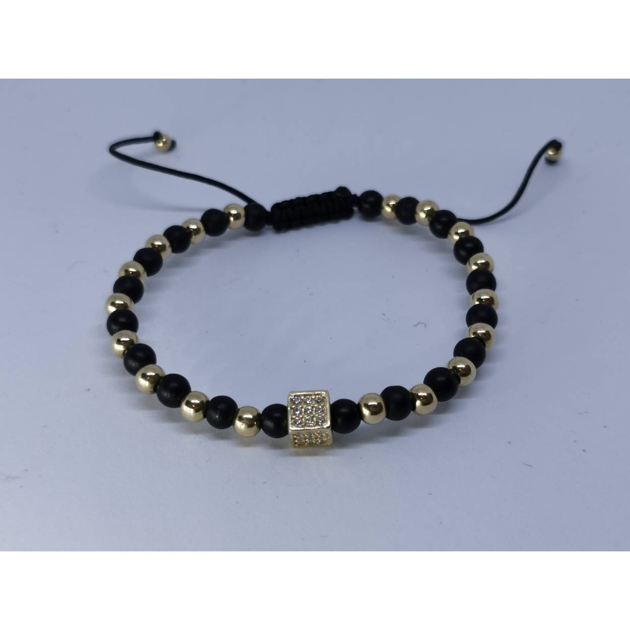 14 Karaat geel gouden armband met zwarte steentjes en zirkonia