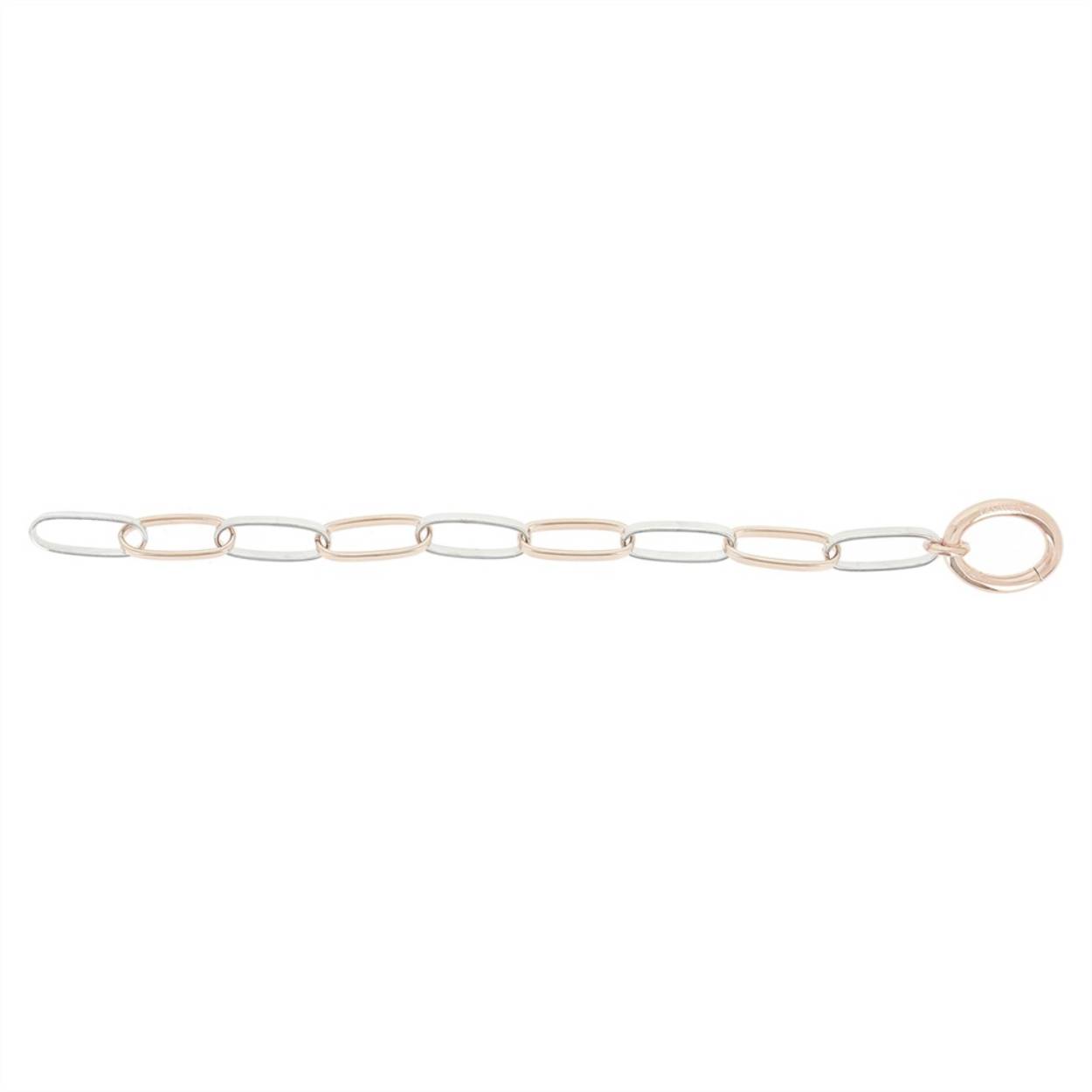 Deze armband is van het merk Pesavento. Het is een damessieraad gemaakt van zilver . De armband is roze van kleur.