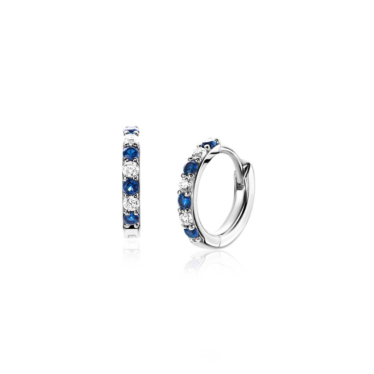 ZINZI zilveren oorringen bezet met afwisselend ronde witte zirconia's en donkerblauwe kleurstenen. De oorringen zijn 12mm groot en de buis is 2mm breed. Met luxe en gemakkelijke klapsluiting. Maak je look compleet met de bijpassende ring! Vervaardigd van eerste gehalte zilver (925) en extra gerodineerd.