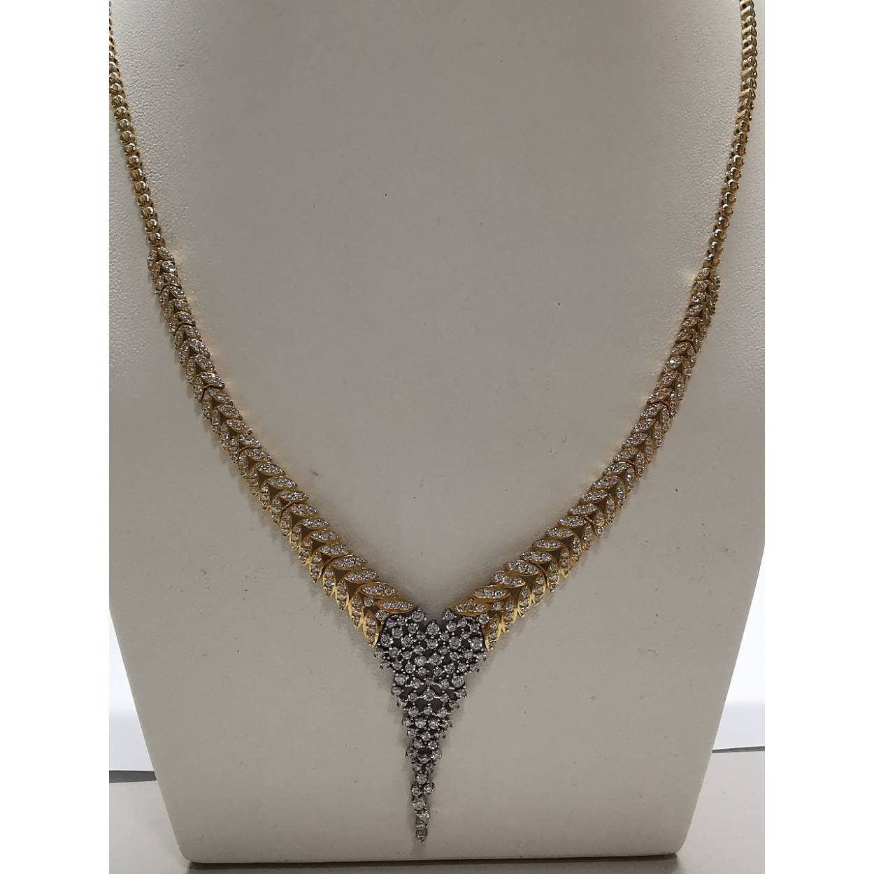 14 Karaat geel/wit gouden collier bezet met zirkonia 