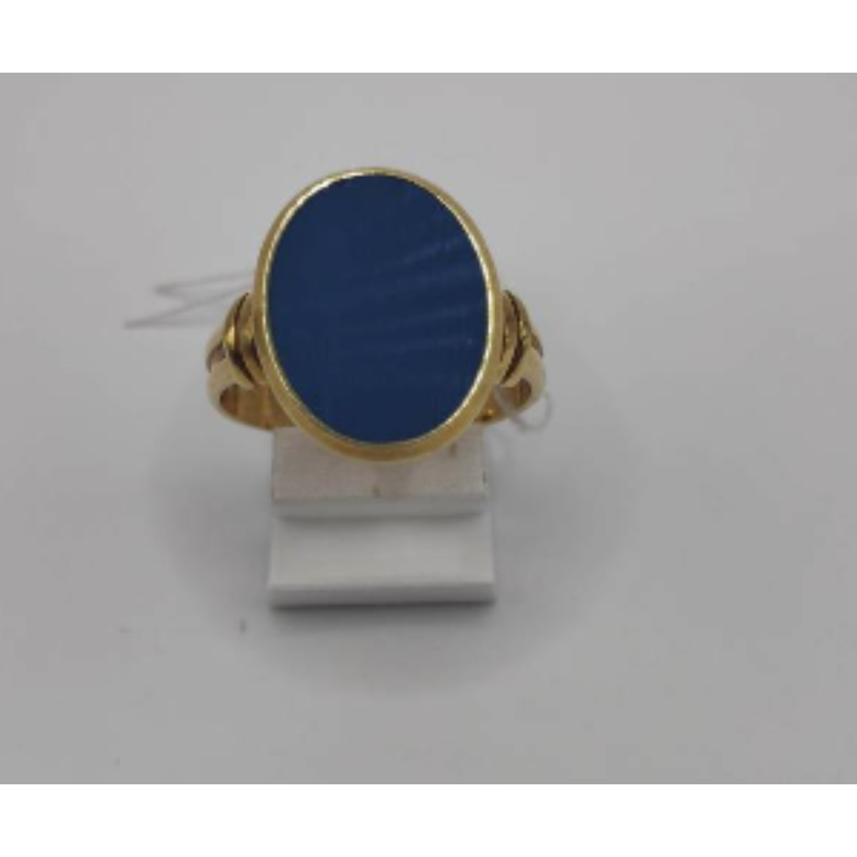 Goude ring met blauwe steen