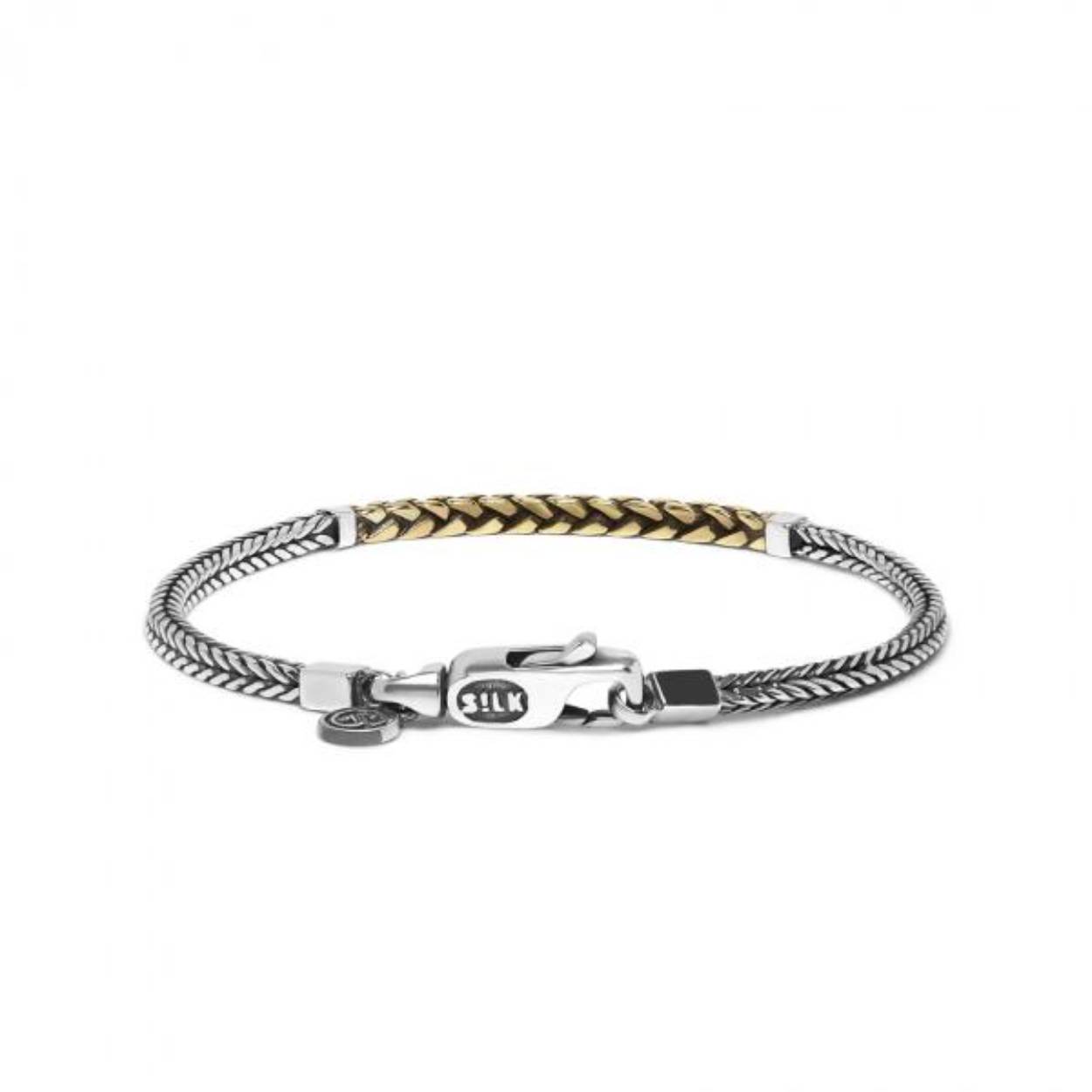 Nieuwkomer in de mini hookserie is deze prachtige handgevlochten bicolor armband. Ben jij gek op de mini hook series en combineer je graag zilver met goudkleurige sieraden? 
Code 650SBR
Kleur Zilver
Materialen Sterling Zilver/Sterling Zilver - Messing
Geslacht Unisex
Collectie CHEVRON
Type sieraad Armband
Breedte 3mm
Sluiting Karabijn sluiting
Garantie 1 Jaar
Graveren Graveren niet mogelijk