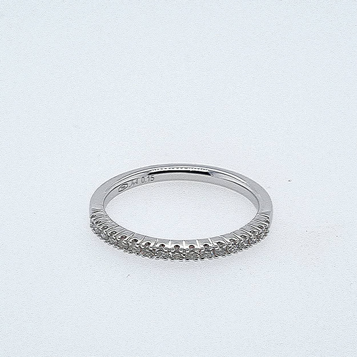 Trouwring  wit goud 18kt met diamanten.