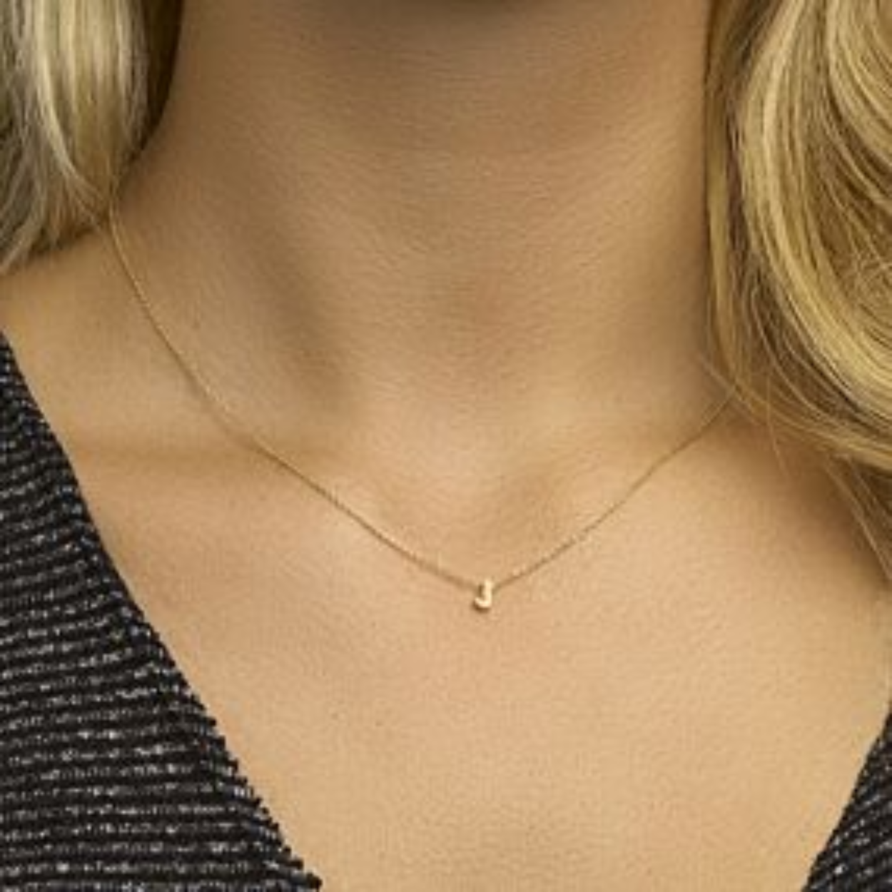 14k Geelgouden hanger uitgevoerd met een letter.