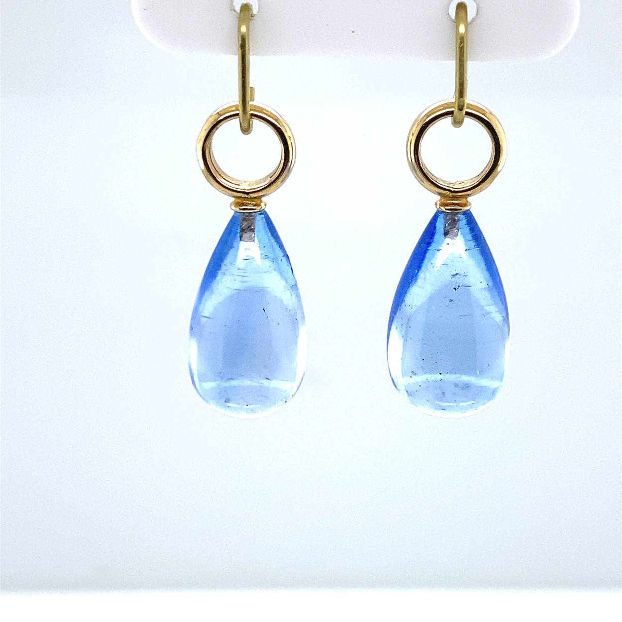 geelgouden oorbedel met blauw topaas voor 4 a 5 mm creool