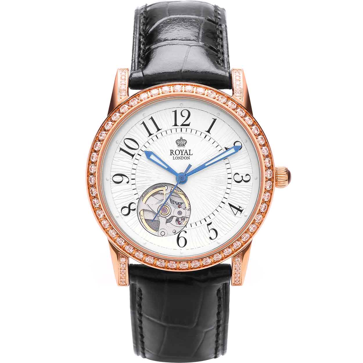 Klassiek dames polshorloge met open hart waardoor automatisch uurwerk deels zichtbaar is. Rand is ingelegd met siersteentjes.