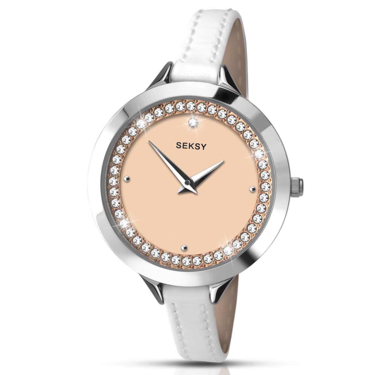 – Artikelnummer : SEK.2155
– Kast maat: 35 mm
– Kast dikte 7 mm
– Kast materiaal: Metaal
– Kastkleur: metale zilverkleurige kast
– Uurwerk type: Onbekend
– Glas type: Mineraal
– Waterdicht: 0 ATM/BAR
– Horlogeband: PU Leder wit met zilverkleurig en gehard-stalen gespsluiting
– Maat aansluiting band: 7 mm
– Wijzerplaat: rosé gouden wijzerplaat met zilvere aanduidingen
– Licht functie: Nee