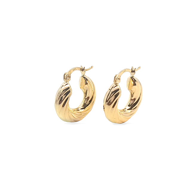 Deze oorringen van Louis Bros zijn vervaardigd uit 14 karaat geelgoud (3.45 gr.). De Oorsieraden hebben een diameter van 20 mm. Deze oorringen vrolijken iedere outfit op. En eindeloos te combineren met andere gouden sieraden. Deze oorringen is stijlvol en gemakkelijk te combineren. De sieraden vormen enerzijds een prachtige basis voor een minimalistische look, of kunnen anderzijds uitgebreid worden met verschillende type sieraden voor een rijke en of een feestelijke uitstraling.